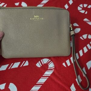Coach Beige Wristlet with Gold Accents